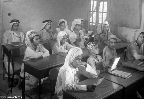 Pupils at their desks in a Kuwaiti classroom of the period
