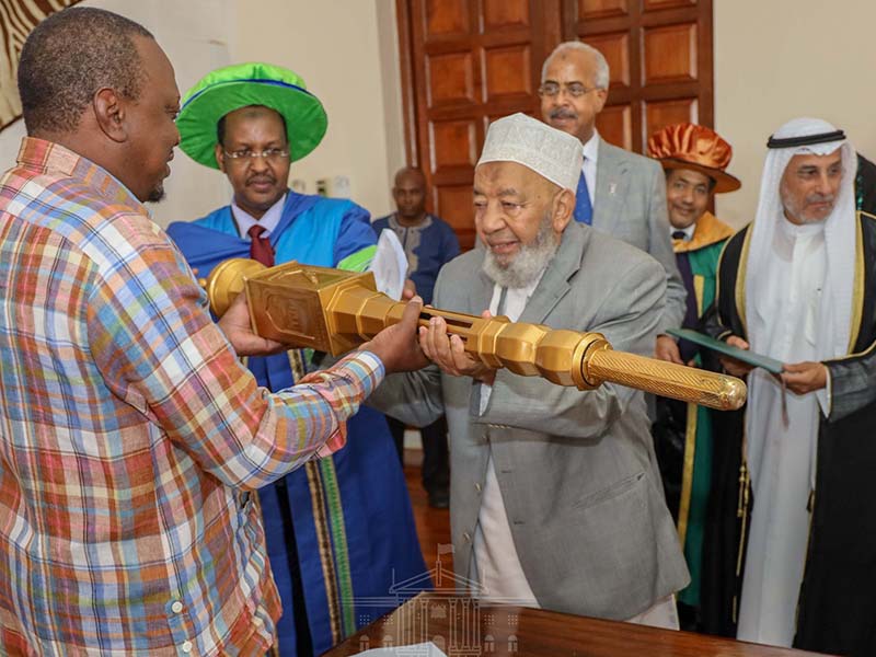 President Uhuru Kenyatta presents the Umma University mace