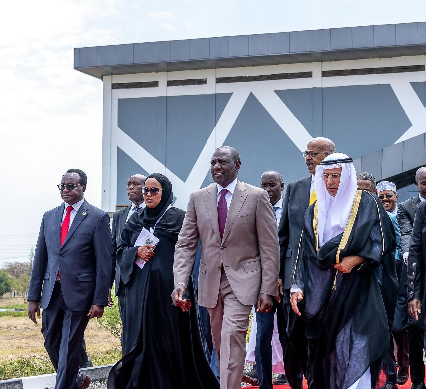 President William Ruto leads the delegation outside the Umma University building