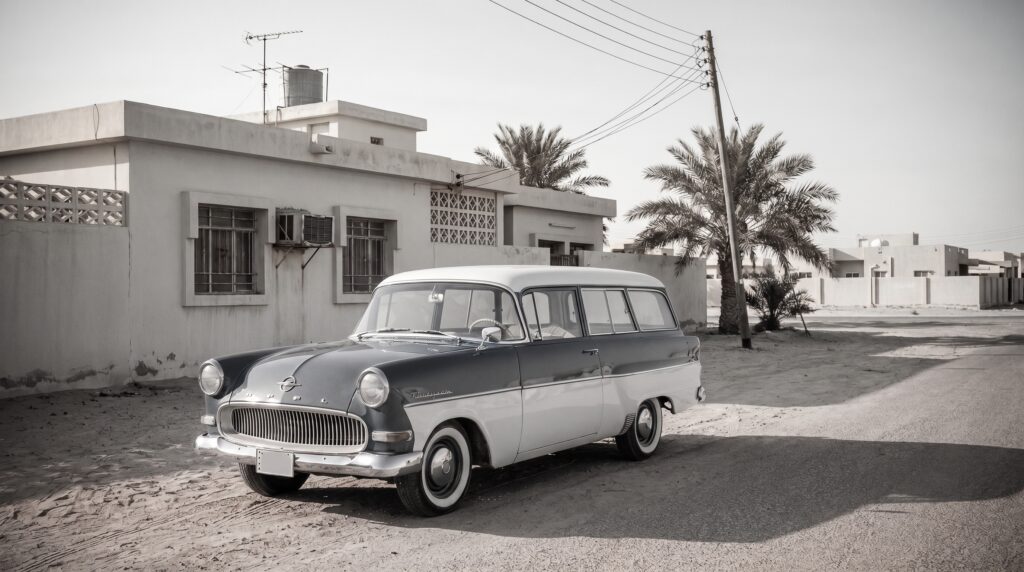 Generative scene: an Opel parked outside a Kuwaiti house