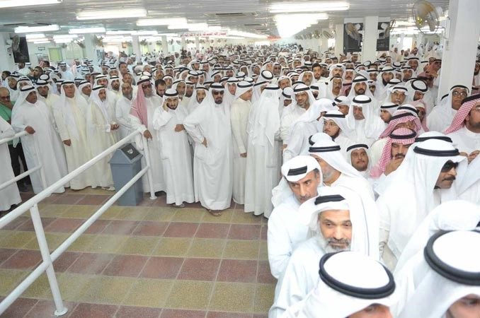 Mourners at the burial of Dr Abdul Rahman Al-Sumait